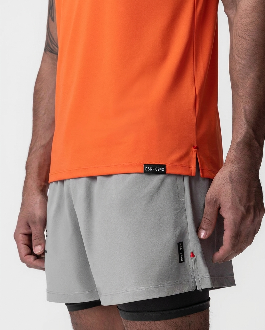 220 Camiseta Essencial Naranja Logo Grande NK - detalle macro